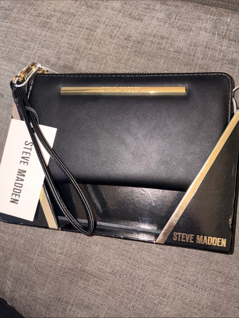 Steve Madden Black Wristlet with Gold Bar Detail